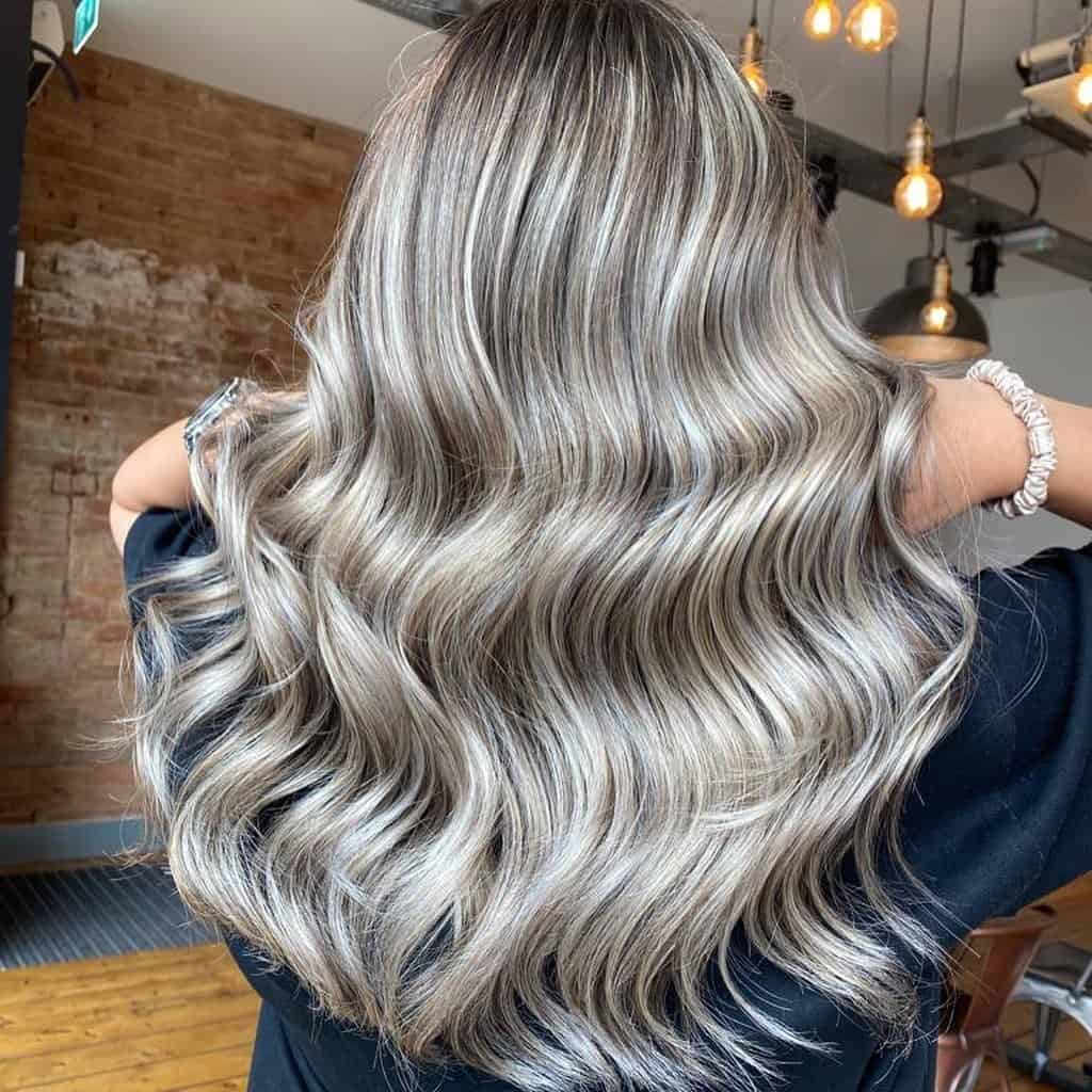Voluminous Hollywood Waves Blonde Highlights