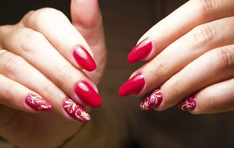 Long Red Nails With Hints Of Gold