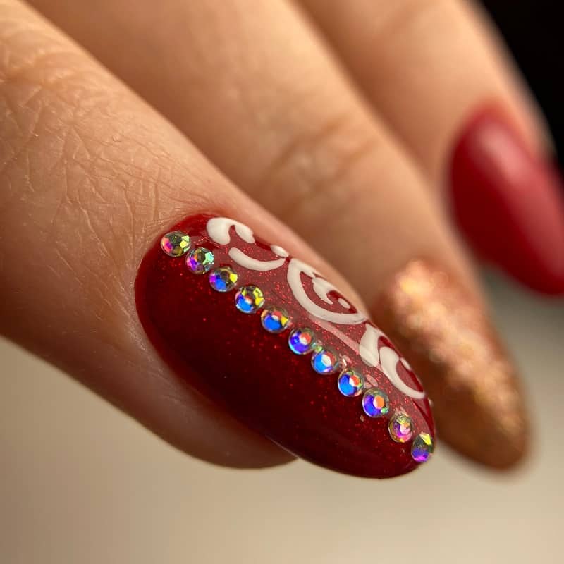 Oval Red Nails With Gemstones