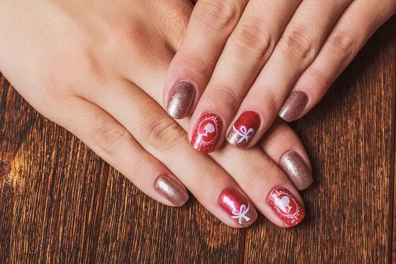 Red Gold Nails With Bow Details