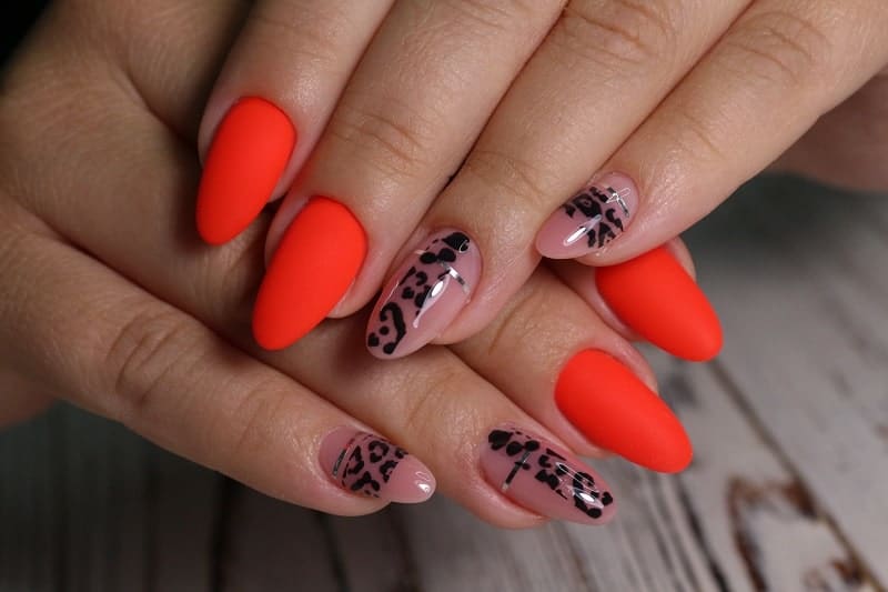 Short Oval Bright Red Nails With Black Prints