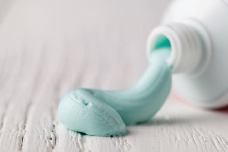 How To Remove Nail Polish( Without Nail Polish Remover)? 3 Toothpaste squeezed out from a toothpaste tube
