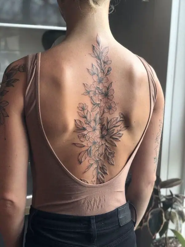 Latest Colorful Flower Tattoo On Women Upper Back