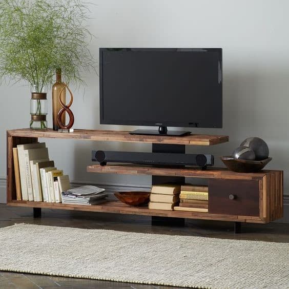 7. Unique Shaped TV Stand With Detailed Elements