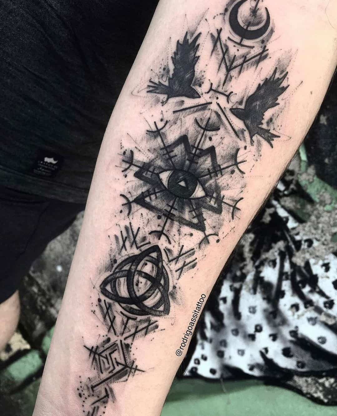 Scottish Symbols Over Forearm In Black Ink