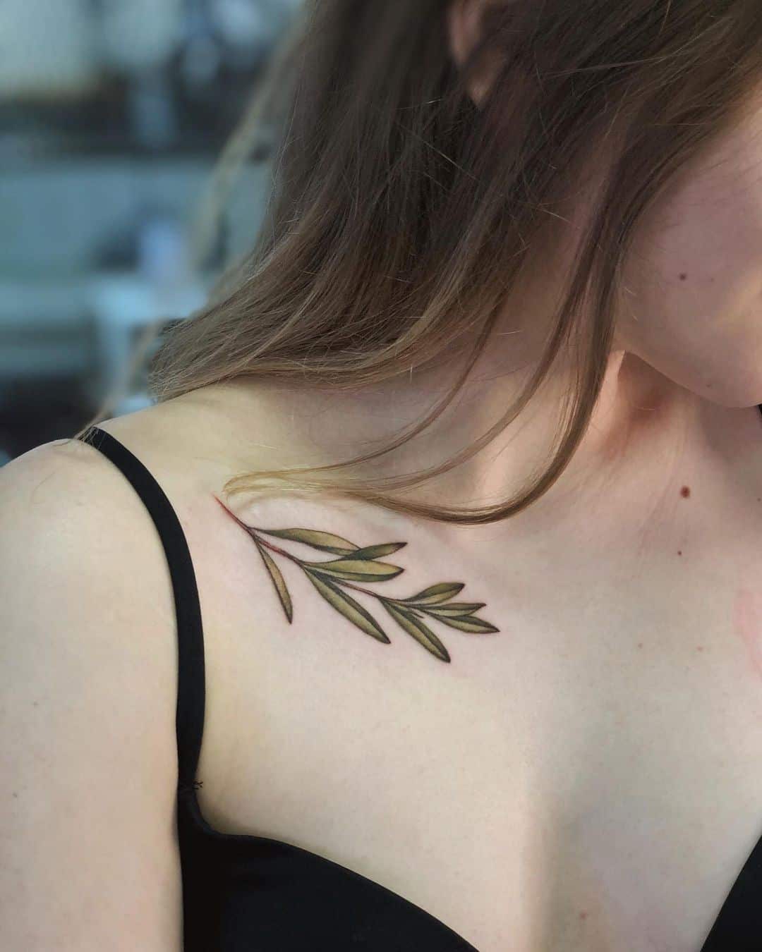 30+ Best Olive Branch Tattoo Design Ideas (2022 Updated!) 21 Green Collarbone Olive Branch Tattoo