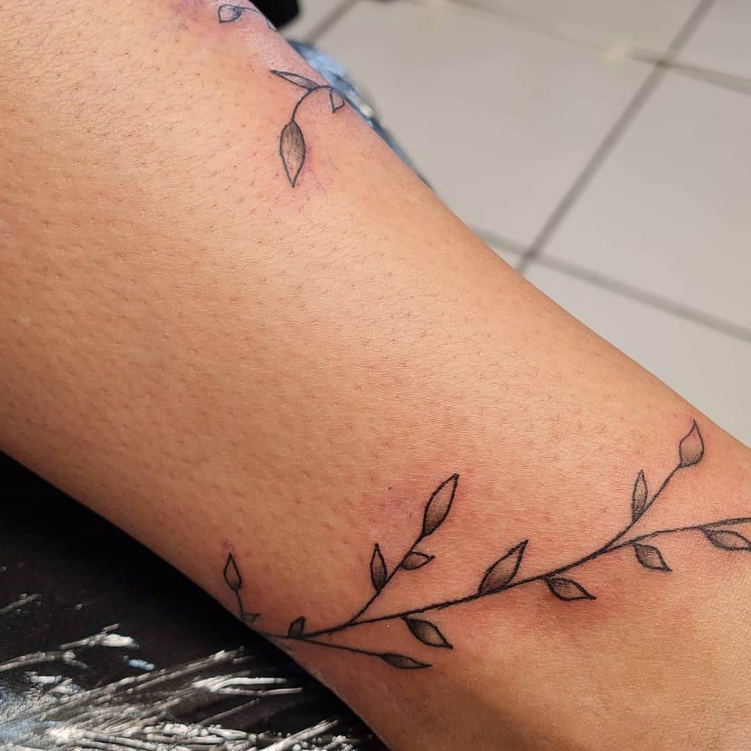 Minimalist Olive Branch Tattoo Design