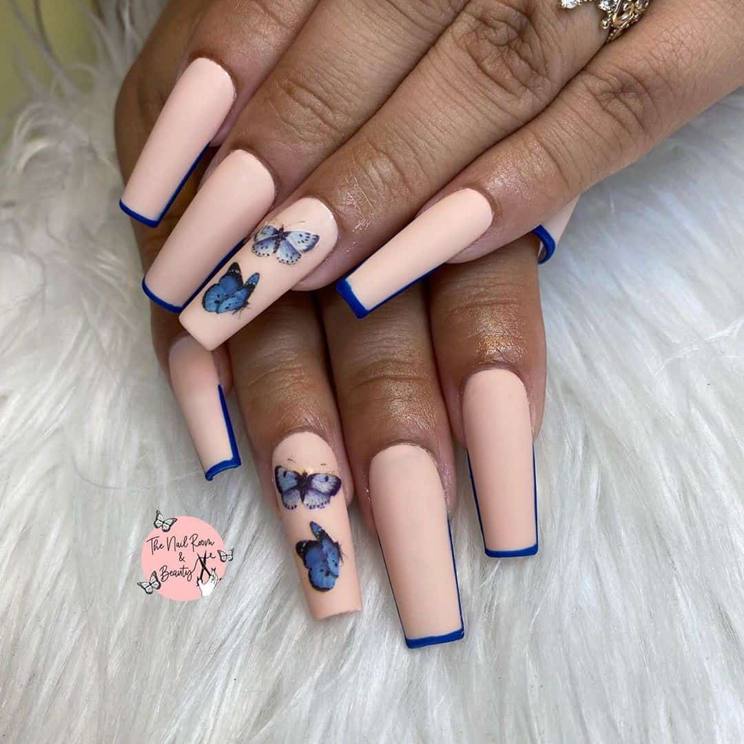 Long Nude Nails With Butterfly Details