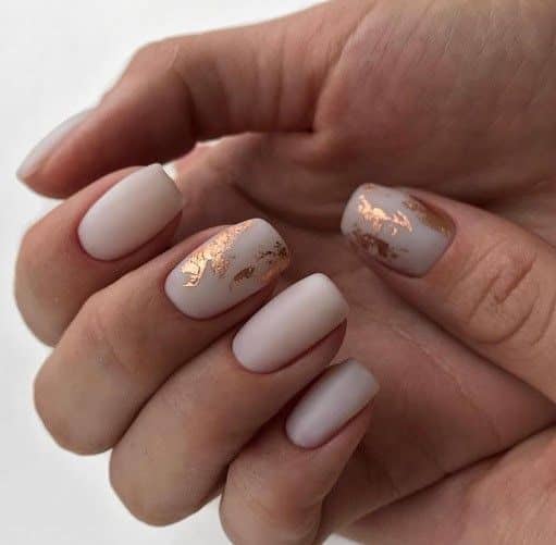 Soft Nude Nails With Golden Leaf Details