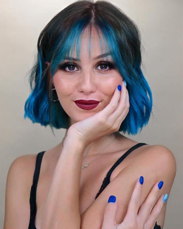 40 Best Blue Highlights on Black Hair Ideas (2023 Update) 25 Blue Bangs On Black Hair 1