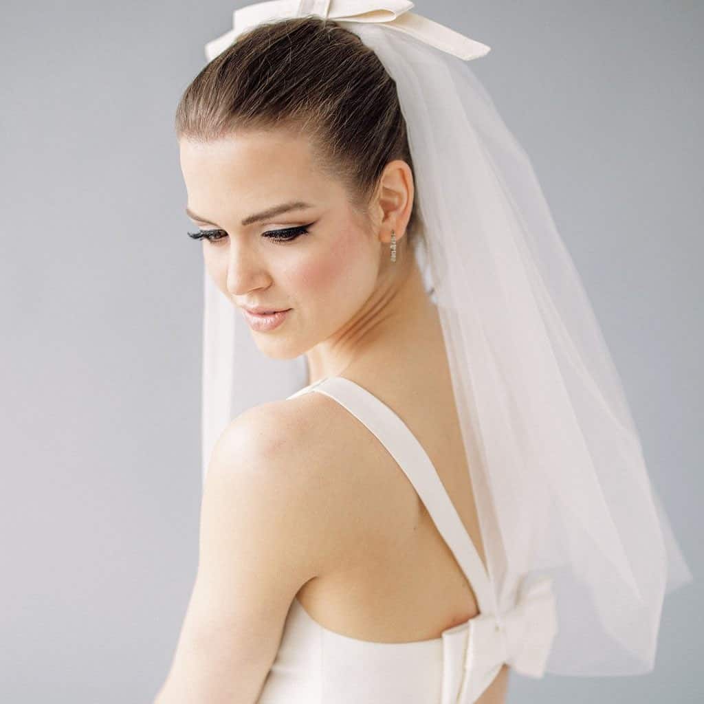 Bow Detail Wedding Hairstyle With Veil