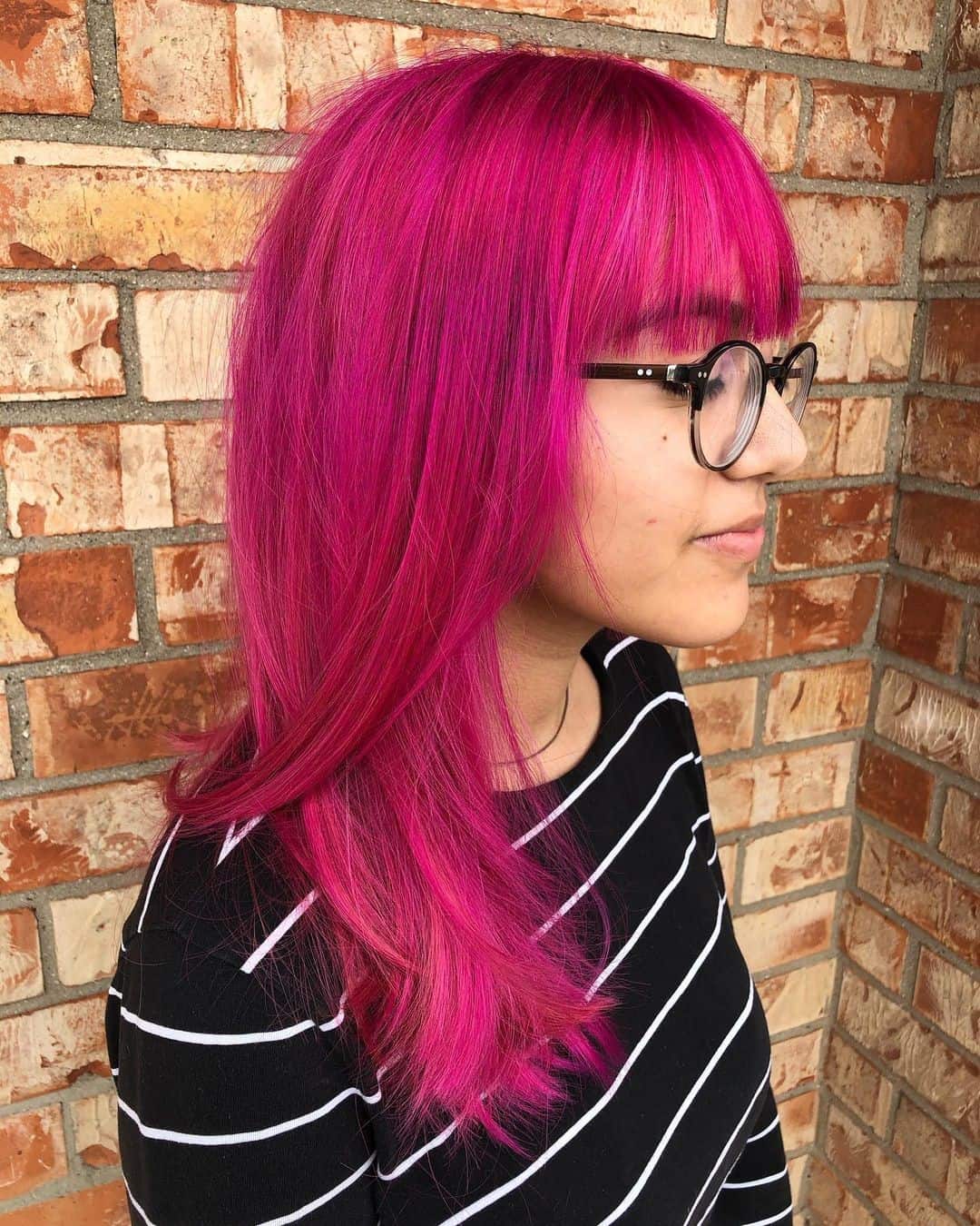 Bright Pink Medium Layered Hair With Bangs