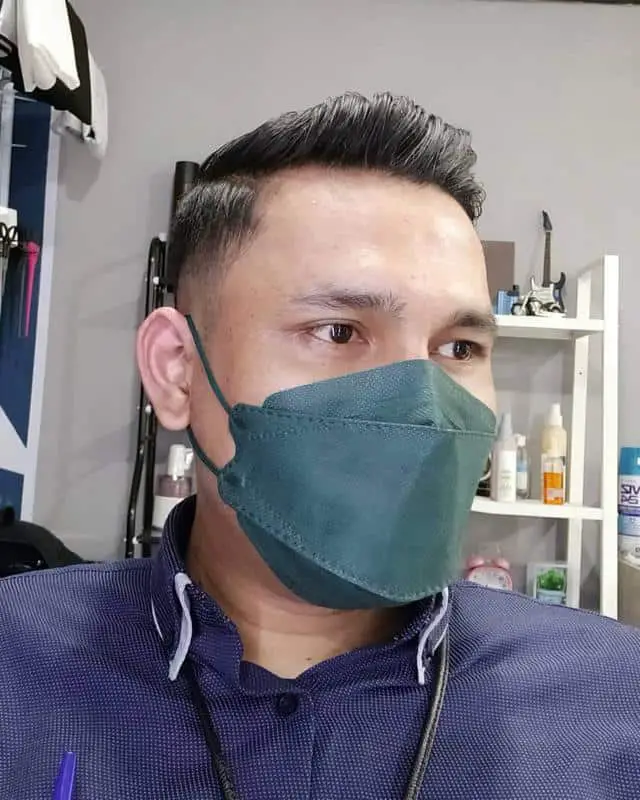 20+ Flattering Hairstyles To Make Your Nose Appear Smaller (2023 Update) 19 Combed Back + Low Fade to Shrink The Nose
