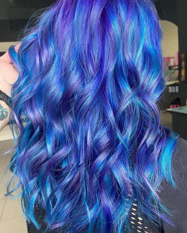 30+ Popular and Eye-Catching Purple and Blue Combination Hairstyles 5 Dark Blue Hair With Purple Highlights 1