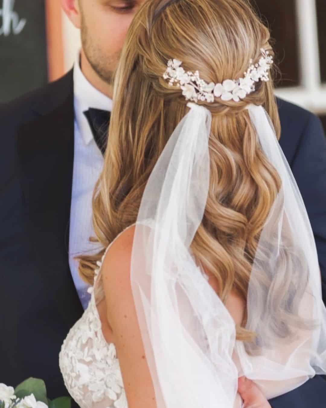 Feminine Wedding Hairstyle With Veil & Flowers