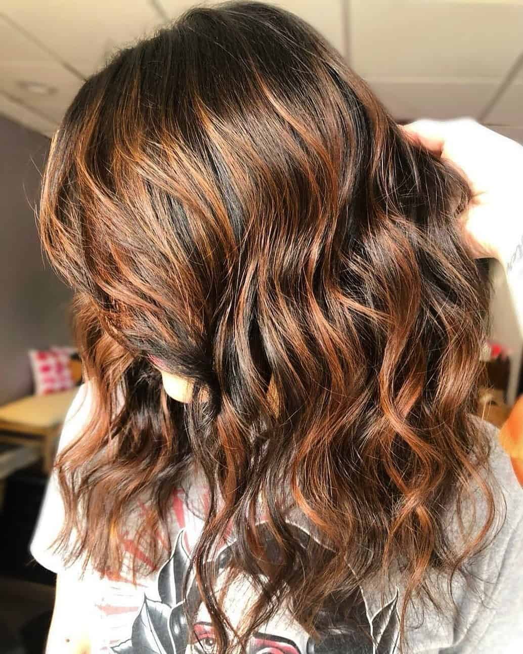 Hot Wavy Copper Highlights On Brown Hair 