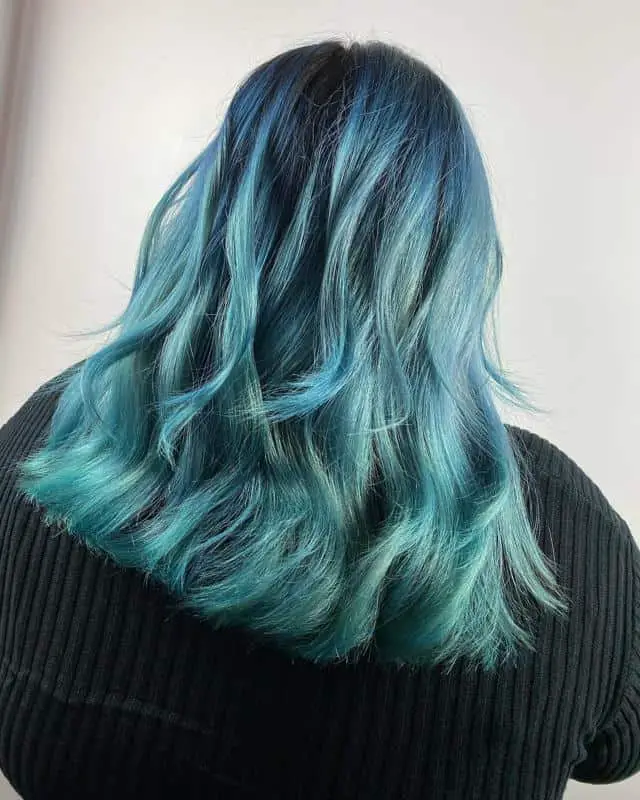 40 Best Blue Highlights on Black Hair Ideas (2023 Update) 36 Icy Blue Highlights 3