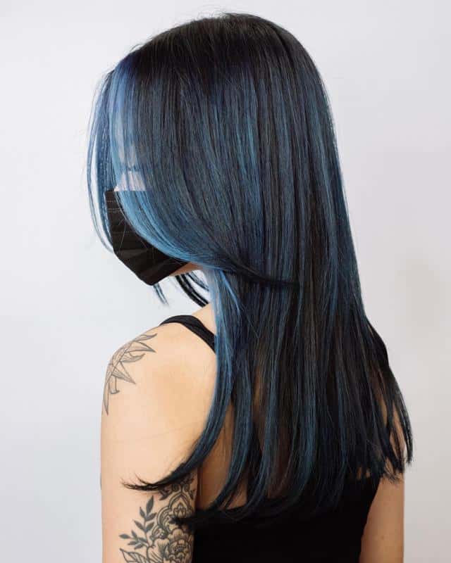 40 Best Blue Highlights on Black Hair Ideas (2023 Update) 10 Long Blue Highlights On Black Hair 1