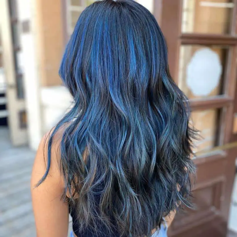 40 Best Blue Highlights on Black Hair Ideas (2023 Update) 12 Long Blue Highlights On Black Hair 3