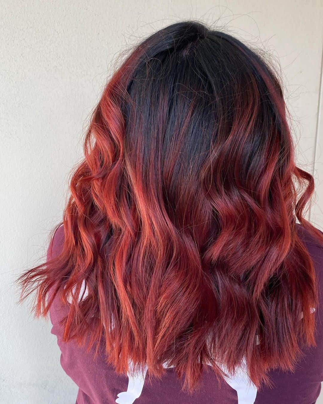 Loose Feminine Curls Red Highlights On Black Hair