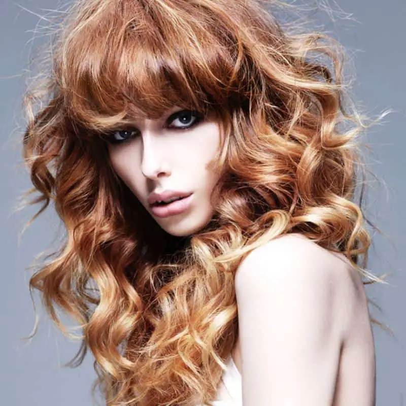 Messy Ginger Hairstyle With Bangs