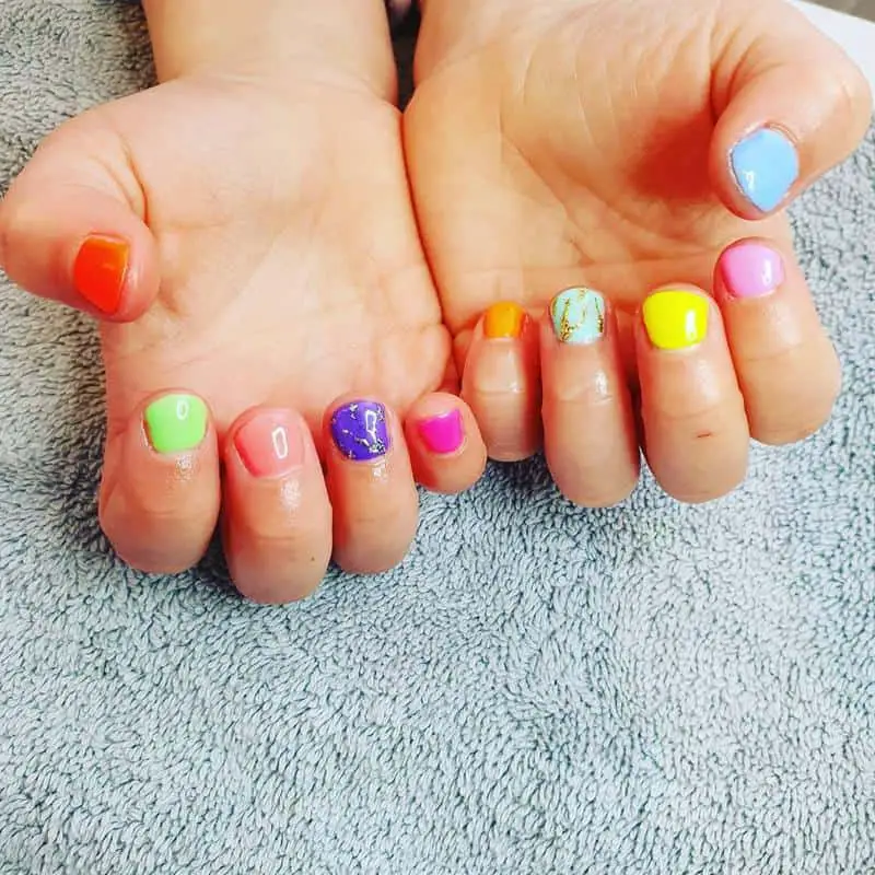 100+ Best Cute Nail Ideas for Kids (2023 Update) 39 Multi-Colored Nails for Kids 3