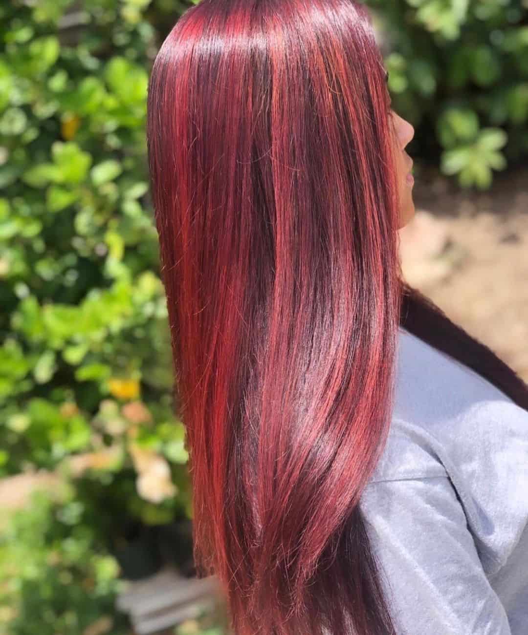 Red Highlights On Black Hair Long Sleek Look 
