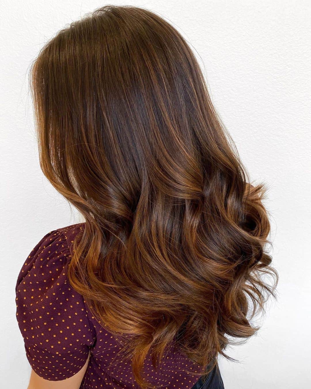 Subtle Caramel Highlights Over Natural Black Hair