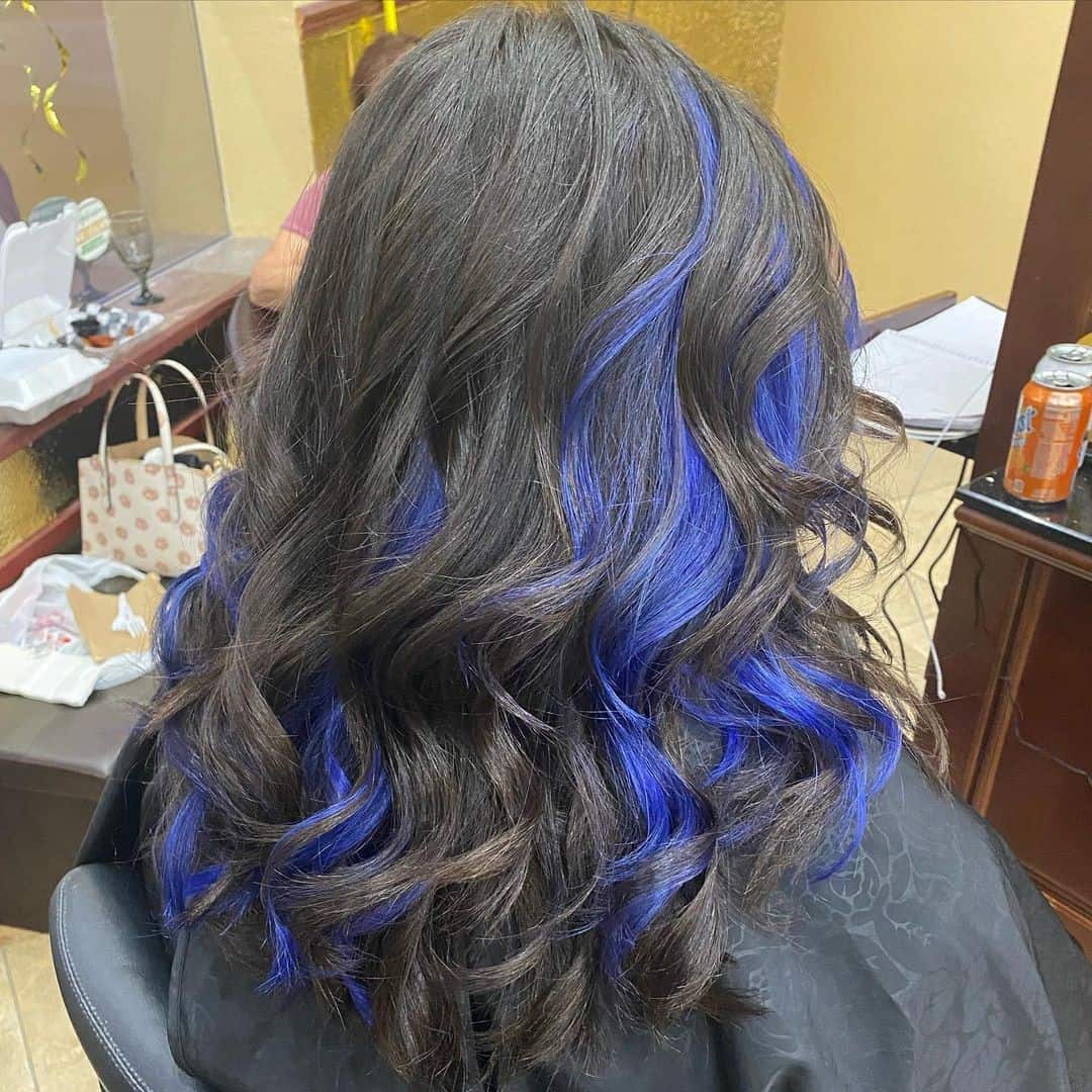 Voluminous Look Black Hair With Blue Highlights 