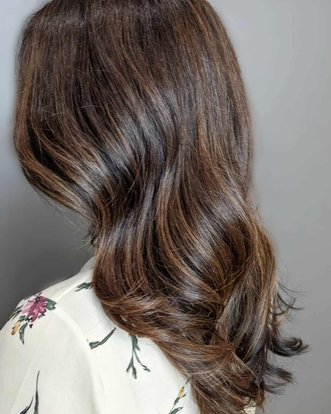 Wavy & Soft Caramel Highlights On Black Hair