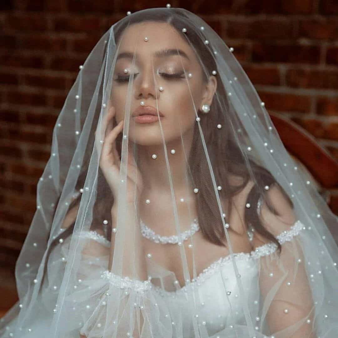 Wedding Hairstyle With Veil And White Beads