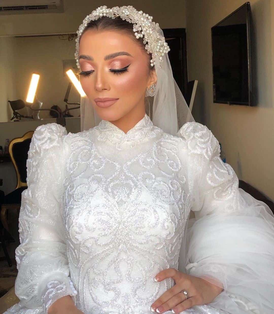 White Wedding Hairstyle With Veil & A Tiara