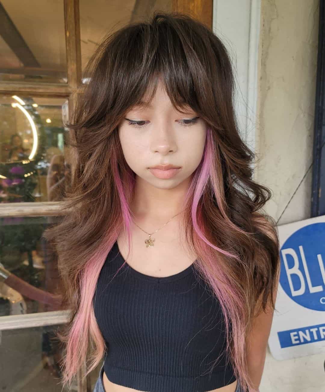 Wolf Cut Haircut With Pink Highlights 