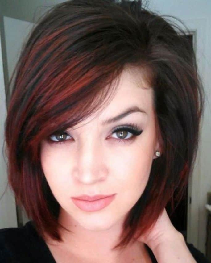 A-Line Bob Hairstyle With Dark Red Highlights And Bangs 2