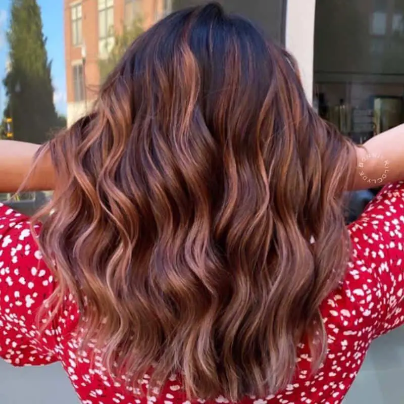 Hair Color Chart: Matching Hair Colors to Your Skin Tone (2023 Update) 23 Amaretto Red Hair