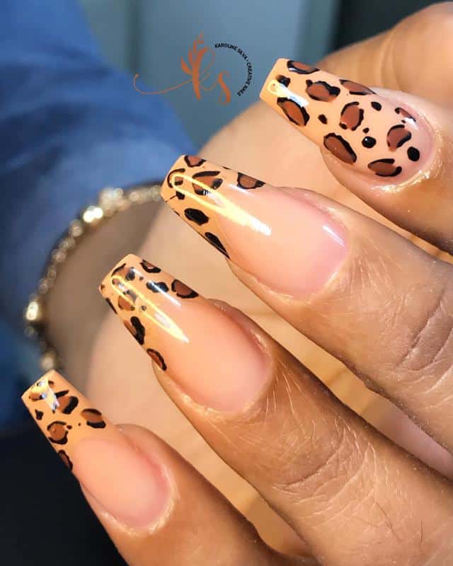 60 Elegant French Tip Nail For A Super Trendy Manicure (2023 Update) 57 Animal Print French Nail Design 1