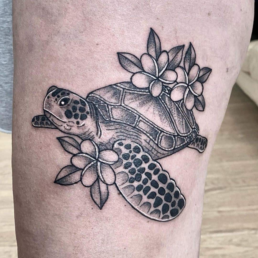 Black Ink Sea Turtle Tattoo With Flowers