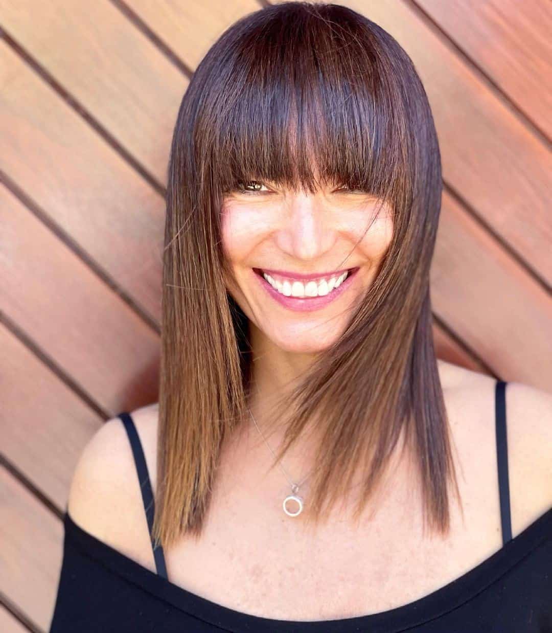 Top 32 Unique Fringe Hairdos for Women: Different Hair Length And Colors (2023 Update) 20 Brown Hair Medium Length Fringe Hair