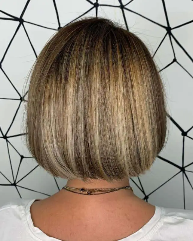 Hair Color Chart: Matching Hair Colors to Your Skin Tone (2023 Update) 7 Caramel Blonde