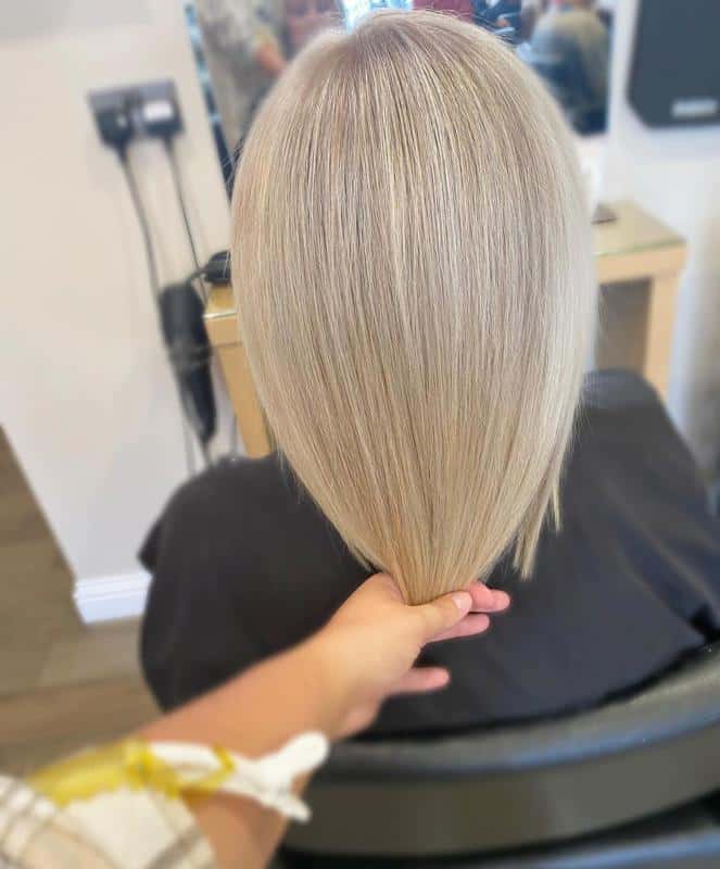 Hair Color Chart: Matching Hair Colors to Your Skin Tone (2023 Update) 15 Champagne Blonde