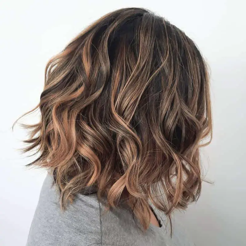Curly A-Line Bob Hairstyle With Multiple-Colored Highlights 1