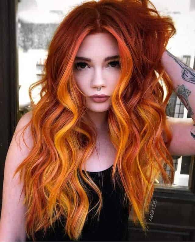 Fiery Red Hairstyle With Highlights 1