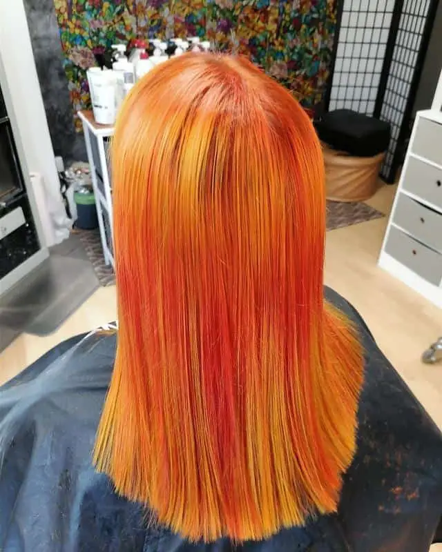 Fiery Red Hairstyle With Highlights 3