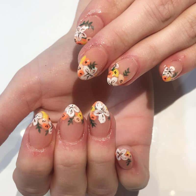 60 Elegant French Tip Nail For A Super Trendy Manicure (2023 Update) 40 Floral French Nail Tip 4