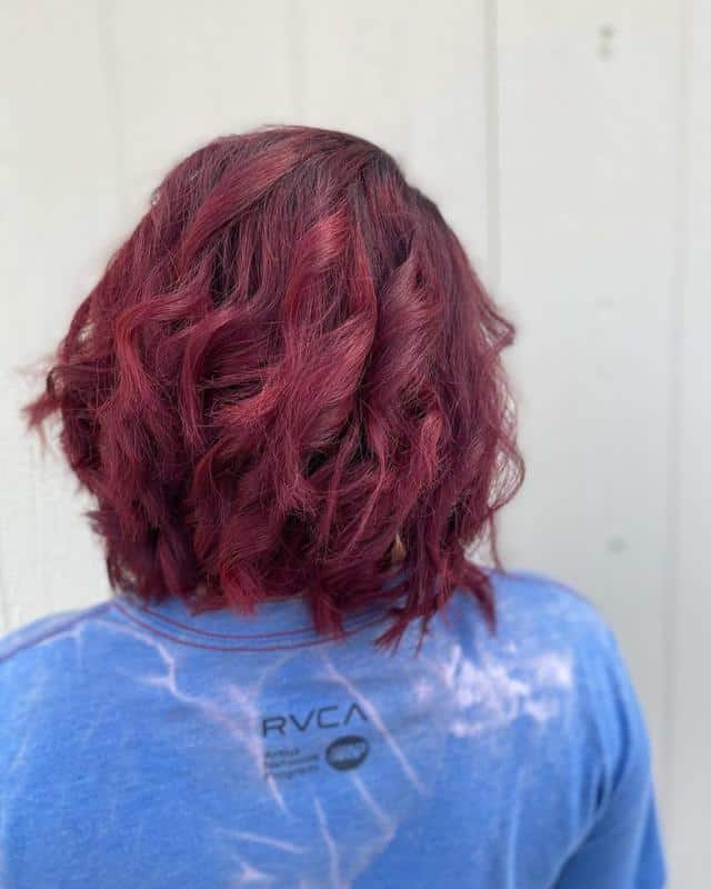 Hair Color Chart: Matching Hair Colors to Your Skin Tone (2023 Update) 24 Garnet Red Hair