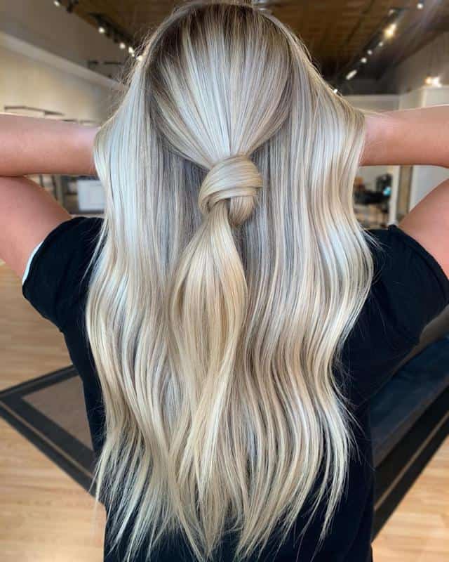 60 Half-Up Half-Down Hairstyles You’ll Fall in Love with (2023 Update) 52 Hair Knot Half-Up, Half-Down 1