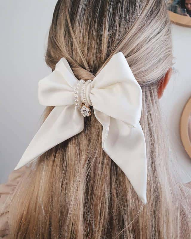 Half-Up, Half-Down Hairstyle With Bows and Ribbons 5