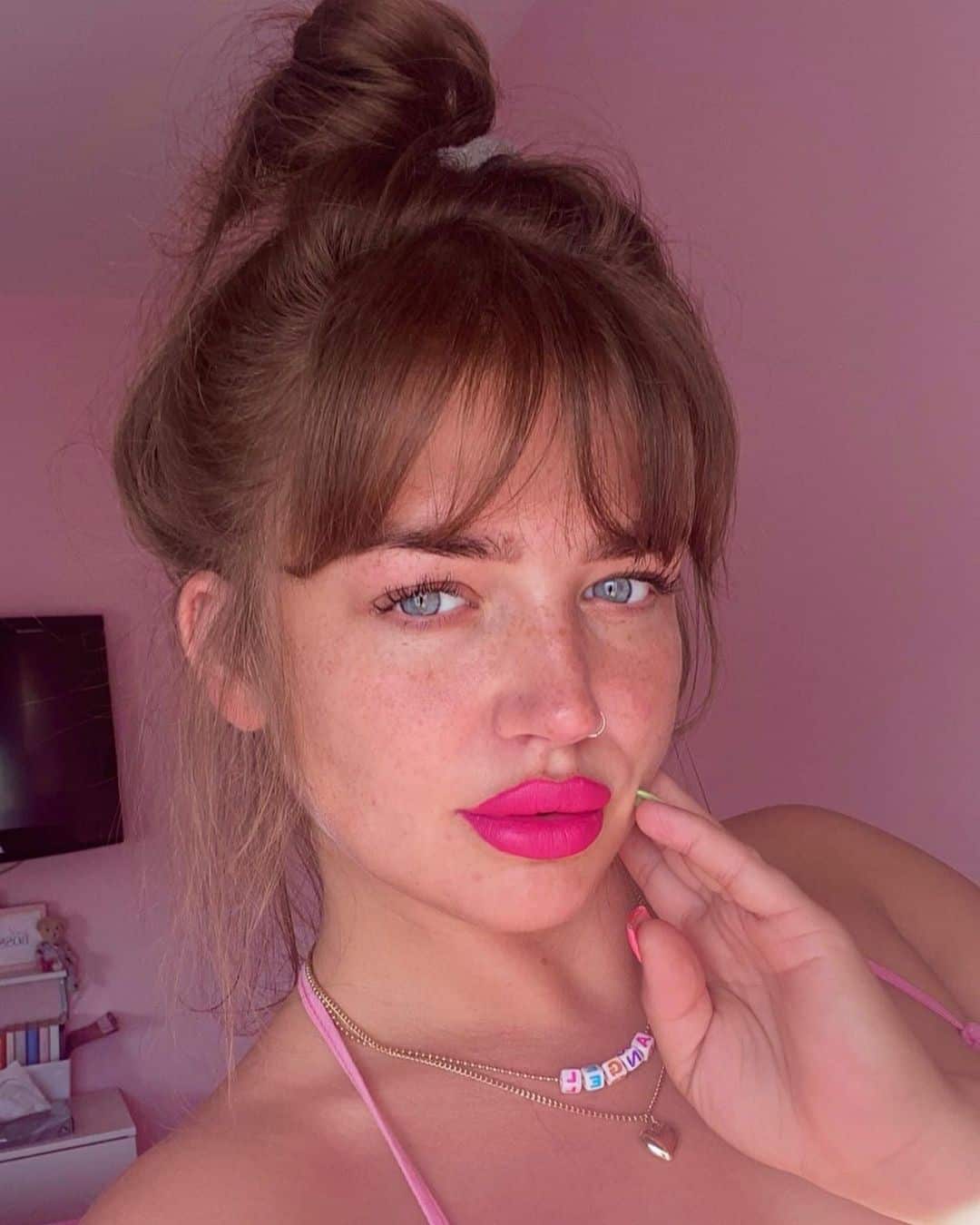 Top 32 Unique Fringe Hairdos for Women: Different Hair Length And Colors (2023 Update) 16 Messy Bun Fringe Hair