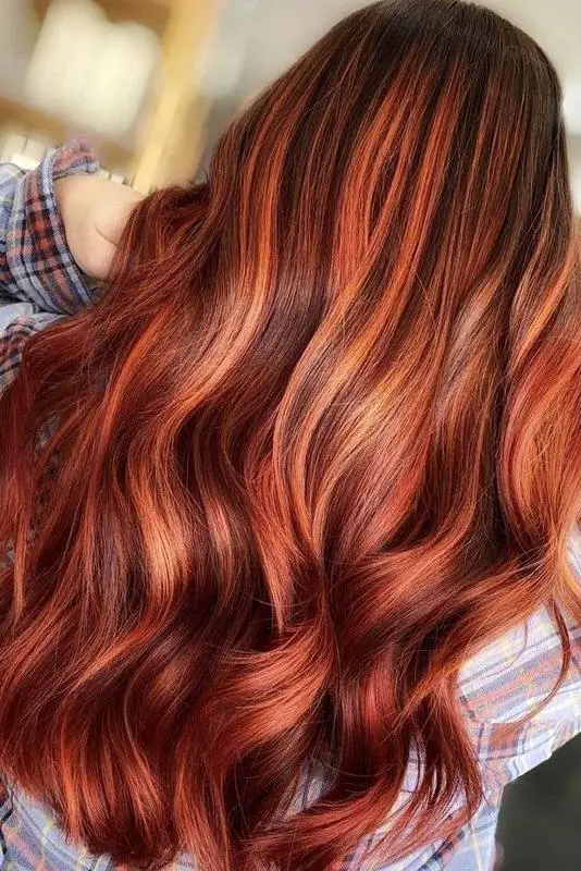 Natural Red Hairstyle With Highlights 1