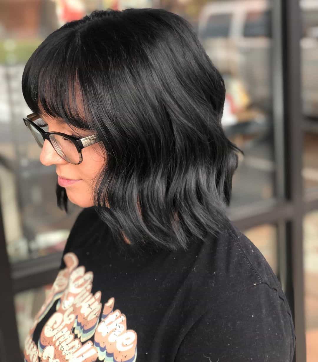 Short Wavy Black Hairdo For Small Forehead